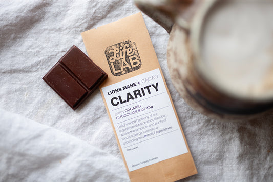 Lion's Mane mushroom chocolate paired with morning coffee, a perfect combination for boosting cognitive function and focus from Life Lab.